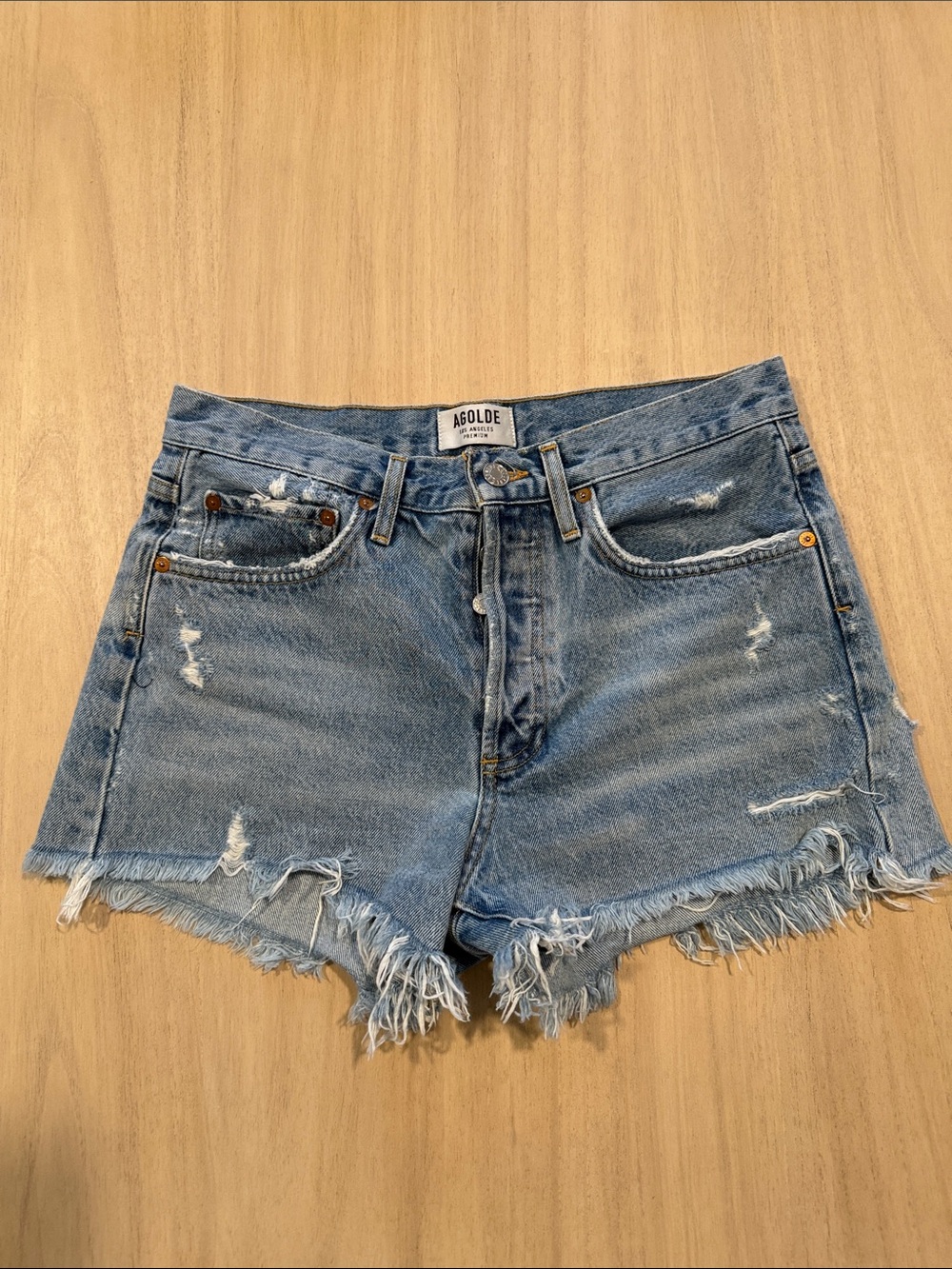 AGOLDE Distressed Denim Cutoff Shorts Size 26 Light Wash Raw Hem Festival